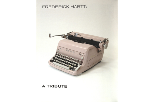 The title page for William Wallace's essay. "Frederick Hartt" is written in the top right of the page and "A Tribute" is written in the lower right. In the center of the page is a picture of a pink typewriter. 